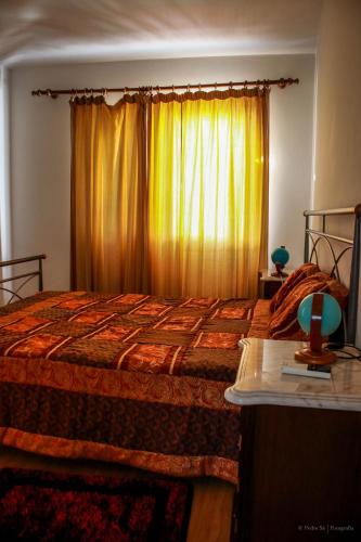 Llit o llits en una habitació de Quinta Das Rossadas