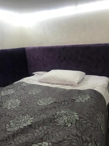 Postel nebo postele na pokoji v ubytování Newtone Apartment