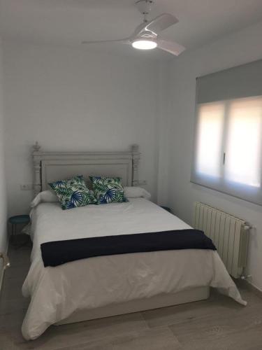 Llit o llits en una habitació de Casa Ferrada