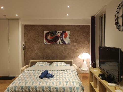 Un ou plusieurs lits dans un hébergement de l'établissement Studio Cannes centre ville 100m des plages