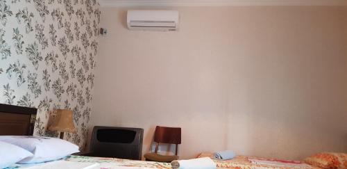 Ein Bett oder Betten in einem Zimmer der Unterkunft Guesthouse Vashlovani