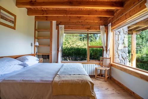 מיטה או מיטות בחדר ב-Colina Del Manzano