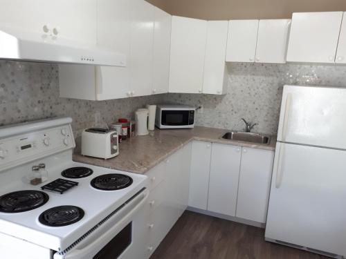 Dapur atau dapur kecil di Les Appartements de La Bergeronnette