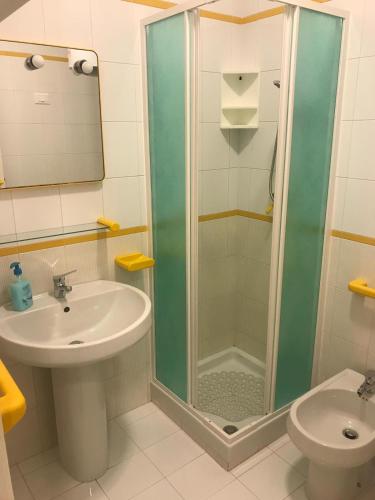 a bathroom with a shower and a sink at Casa Vacanze Ciullo d'Alcamo in San Vito lo Capo