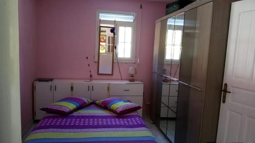 Postel nebo postele na pokoji v ubytování Maison mitoyenne
