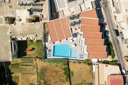 an overhead view of a building with red roofs at Yacinthos in Rethymno