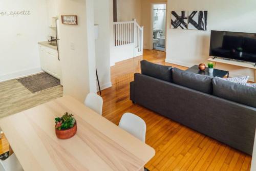 a living room with a couch and a table at 1BR Modern Apt in the Heart of the City - Marshfield G in Chicago