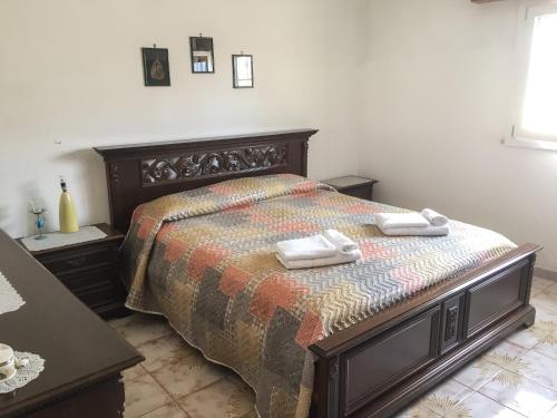 Katil atau katil-katil dalam bilik di Villa Torretta - La casa di Luca