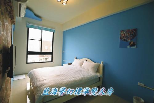 Cama o camas de una habitación en Feng-Tian Inn