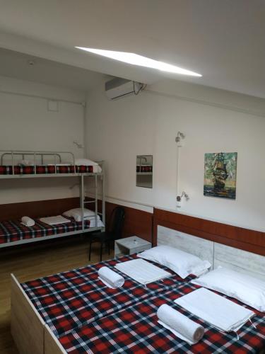Кровать или кровати в номере Hostel Portal