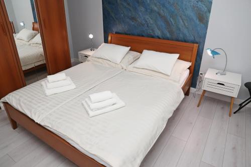 Postel nebo postele na pokoji v ubytování Apartment Eva