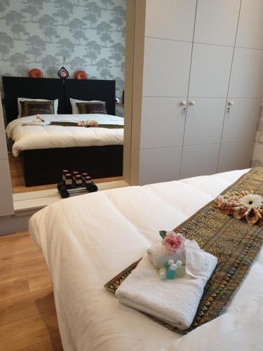 Una cama o camas en una habitación de BAAN SIAM