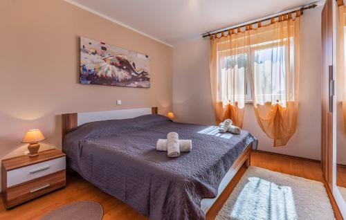 Postel nebo postele na pokoji v ubytování Apartment Meri