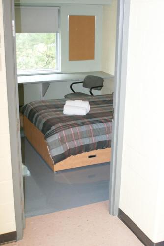 Residence & Conference Centre - Sudbury Westにあるベッド