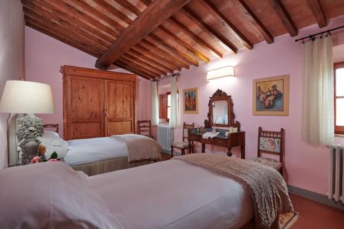 Tempat tidur dalam kamar di Santa Maria a Poneta