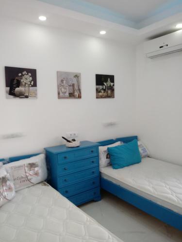 Posteľ alebo postele v izbe v ubytovaní B&A Paralia