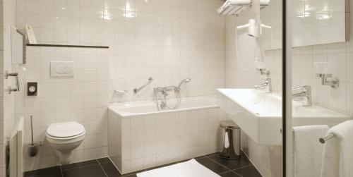 Een badkamer bij Hotel Creusen