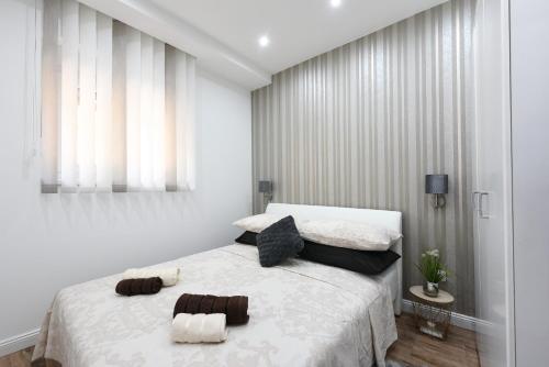Posteľ alebo postele v izbe v ubytovaní Shine apartment Zadar