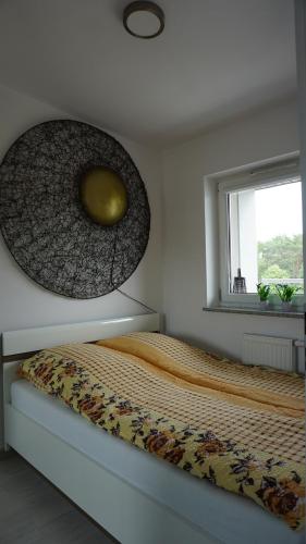 Ένα ή περισσότερα κρεβάτια σε δωμάτιο στο Apartament_20