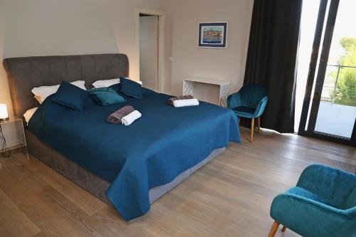 Katil atau katil-katil dalam bilik di Seaside villa at Prizba