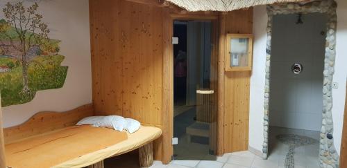 
Ein Bett oder Betten in einem Zimmer der Unterkunft Hotel Garni Hügellandhof
