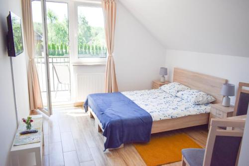 Postel nebo postele na pokoji v ubytování Megan