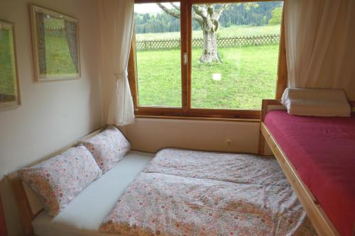 Postel nebo postele na pokoji v ubytování Wohlfühlchalet Tirol