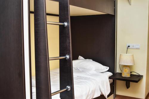 Postel nebo postele na pokoji v ubytování Gelati Tower