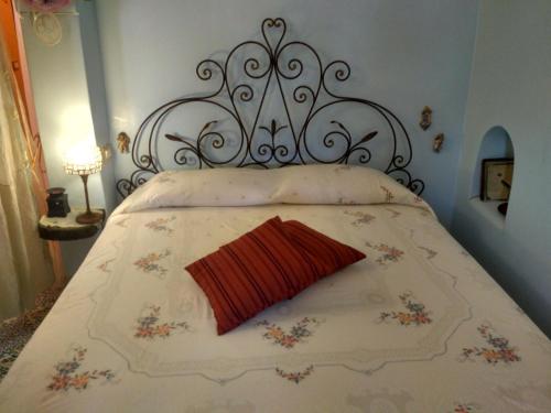 Postel nebo postele na pokoji v ubytování i dammusi di Egle