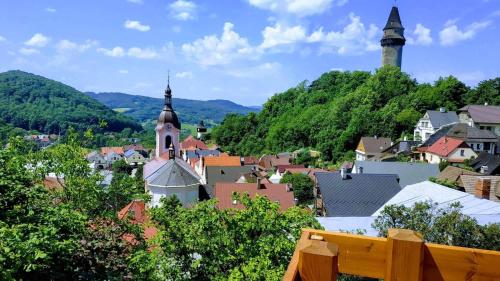 a view of a town with mountains in the background at Bílá hora Štramberk in Štramberk