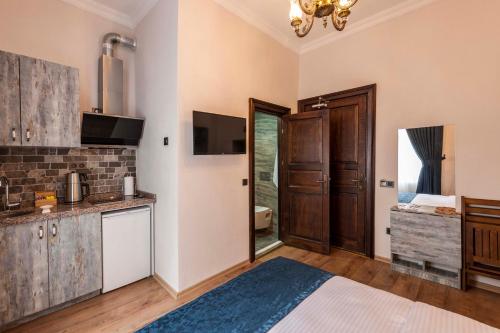 a kitchen with a sink and a counter top at Element Garden in Istanbul