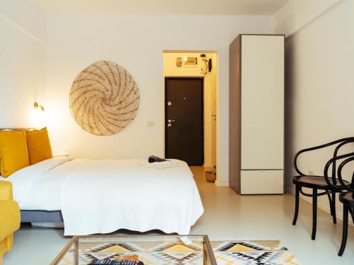 מיטה או מיטות בחדר ב-Top Location - Queen Elizabeth Studio Flat