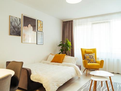 Ein Bett oder Betten in einem Zimmer der Unterkunft Romanian Atheneum Apartment
