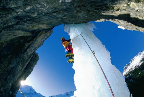 a person on a snowboard in an ice cave at Alpenpension Elferblick in Neustift im Stubaital