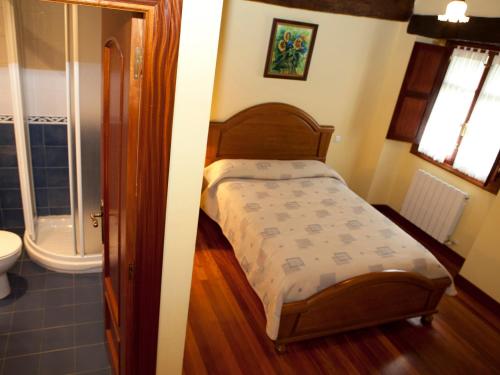 Кровать или кровати в номере Goikoetxe Baserria