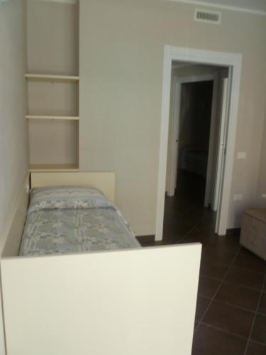 Postel nebo postele na pokoji v ubytování Le Vele Residence