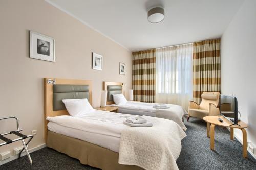 Posteľ alebo postele v izbe v ubytovaní 404 Rooms Wilanowska