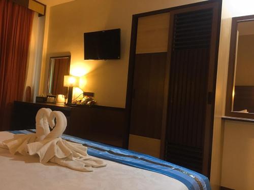 BB Mantra Boutique Hotelにあるベッド