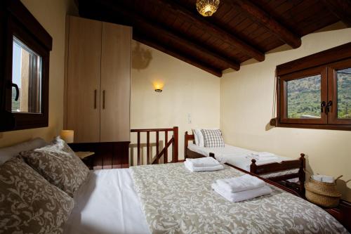 Posteľ alebo postele v izbe v ubytovaní Kagiampakis Concept Residences