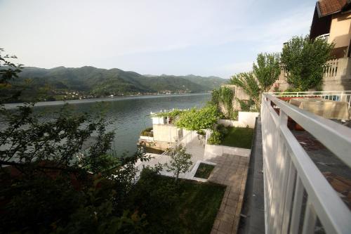 a view of a river from a balcony at Keep calm Lake edition in Konjic