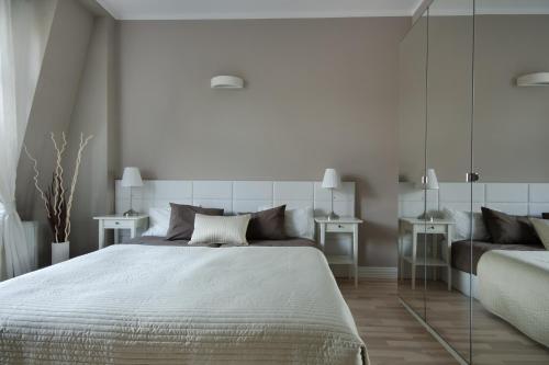 Katil atau katil-katil dalam bilik di Apartament Molo