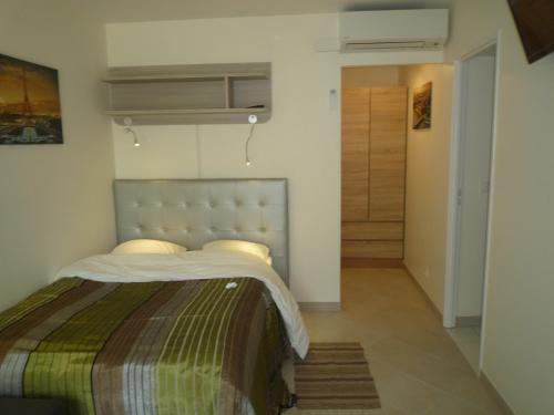Postel nebo postele na pokoji v ubytování chambres d'hôtes Villa Soleil