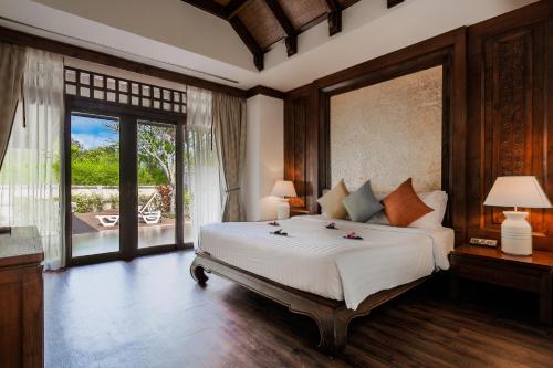 Krevet ili kreveti u jedinici u objektu Nora Beach Resort & Spa - SHA Extra Plus