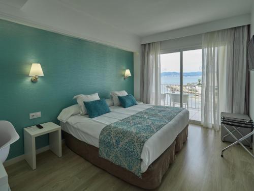 Postel nebo postele na pokoji v ubytování BQ Apolo Hotel