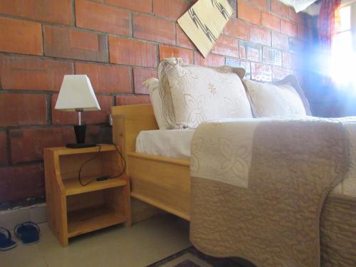  Rebero Kivu Resort -  Chambre  photo :   Shower    Balcony    Refrigerator                           