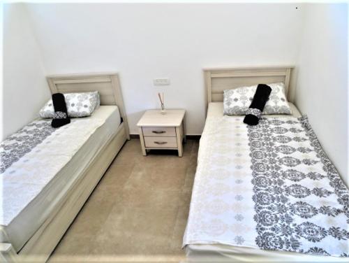 Ένα ή περισσότερα κρεβάτια σε δωμάτιο στο Moab Palaces
