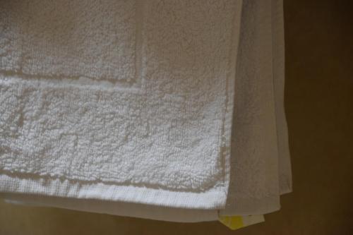 Postel nebo postele na pokoji v ubytování Hostal Manuela