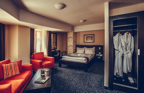 Postel nebo postele na pokoji v ubytování Hotel Cherica