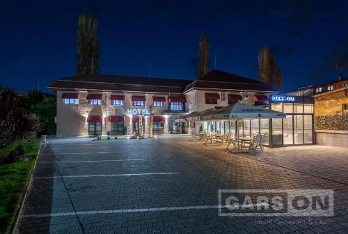 an empty parking lot in front of a building at GarsON in Kŭrdzhali