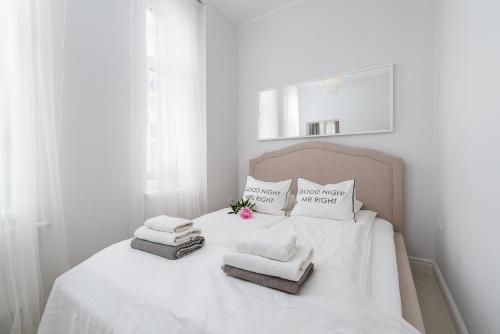 Кровать или кровати в номере Apartament Sensual SAUNA&JACUZZI Poznań Stare Miasto
